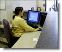 Image of receptionist viewing in out board